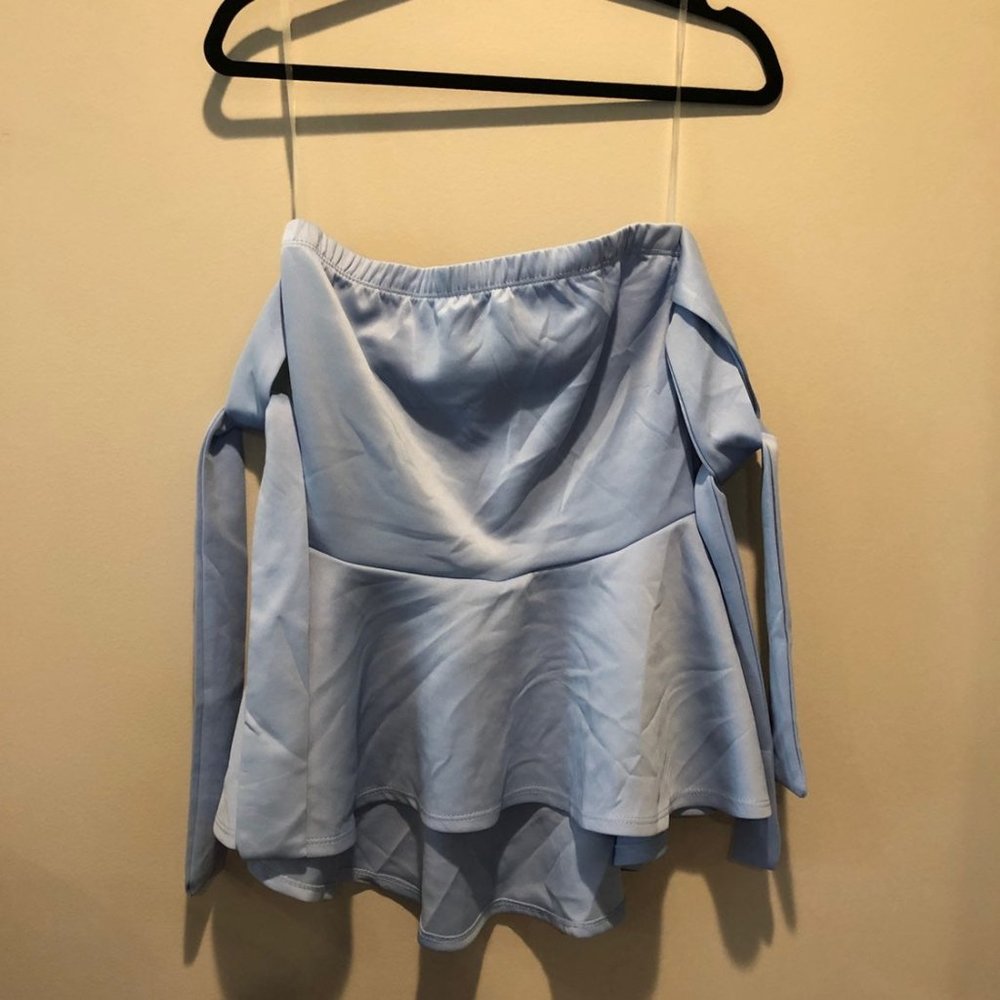 Baby blue elastic peplum top with ties